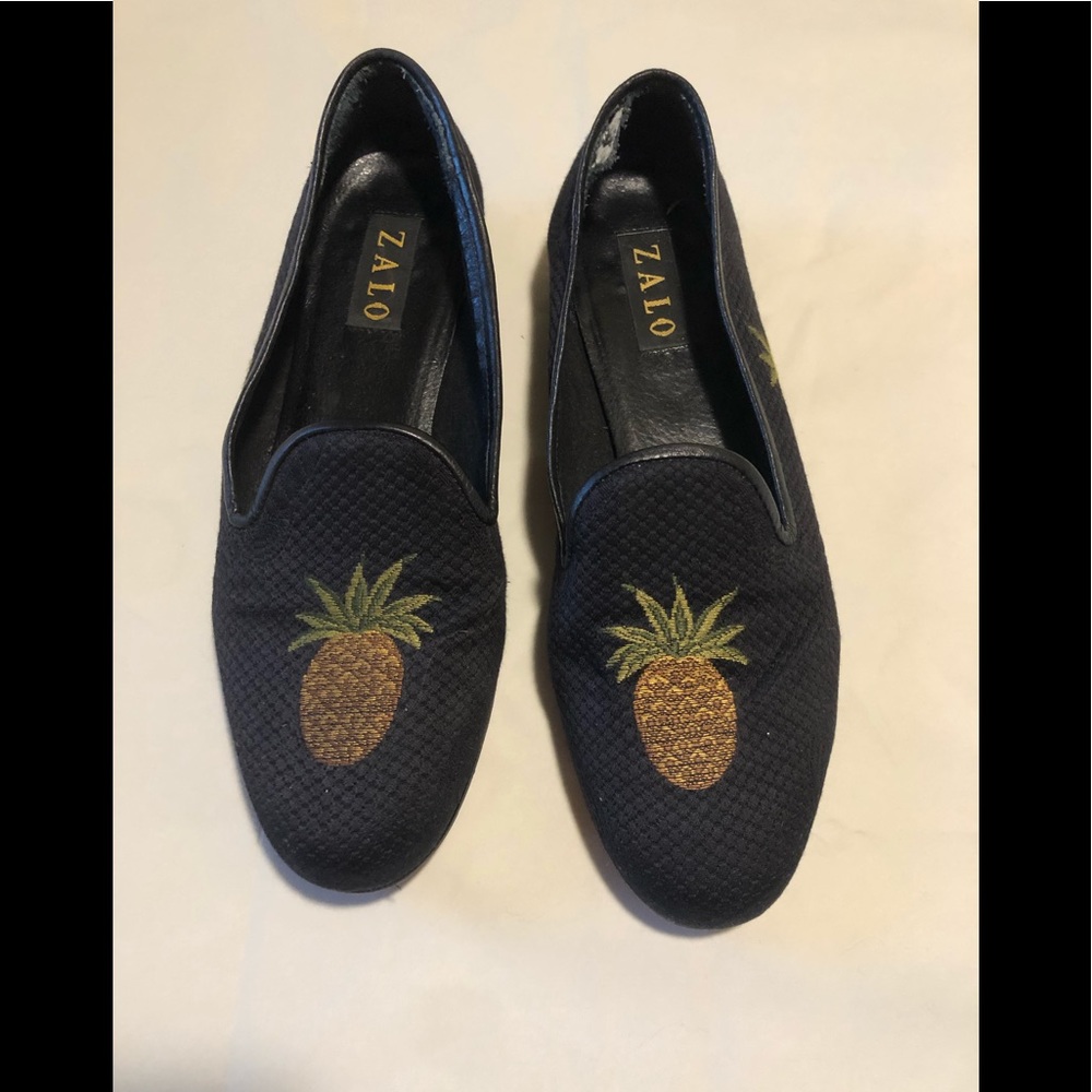 The House of Zalo black fabric loafers with Pinapples embroidered on them